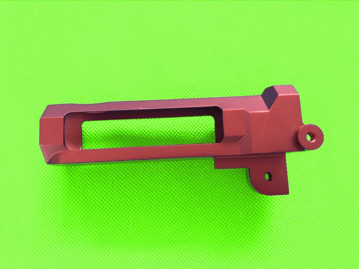Red anodized machined parts